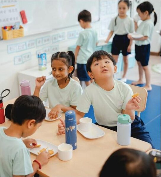 Children enjoying snack time together at Lighthouse Preschool